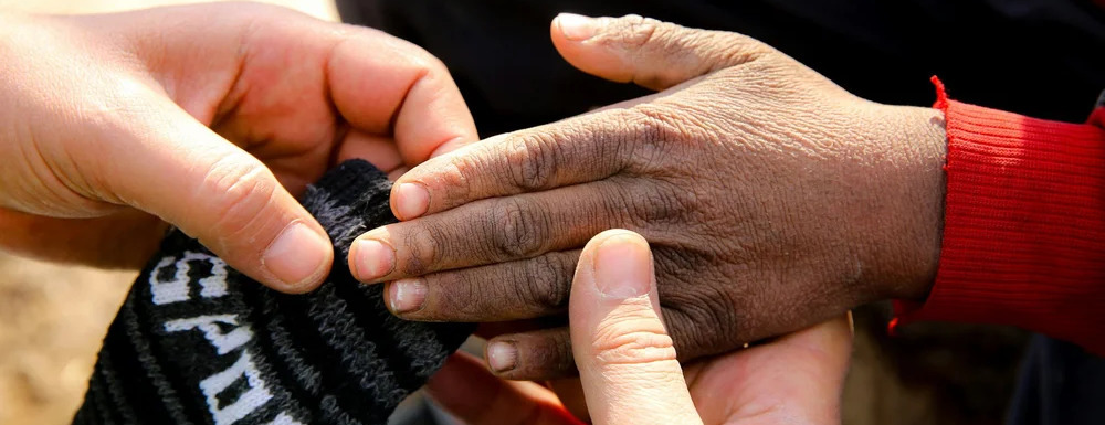 "Helping Impoverished Neighbors Thrive" Extra Mile Event